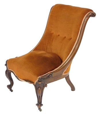 Lot 586 - A Victorian mahogany scroll back nursing chair,...