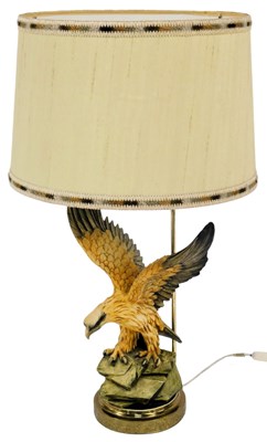 Lot 283 - A 20thC table lamp, modelled as an eagle with...