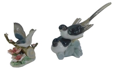Lot 35 - A Lladro porcelain figure group, modelled as...