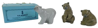Lot 49 - Three Lladro porcelain bears, comprising one...