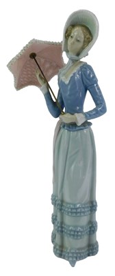 Lot 39 - A Lladro porcelain figure, modelled as a lady...