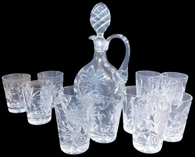 Lot 130 - A cut glass jug and stopper, of compressed...