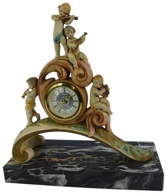 Lot 132 - A 20thC Italian resin mantel clock, the...