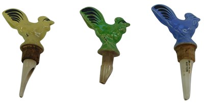 Lot 133 - A set of three Solian pottery wine pourers,...