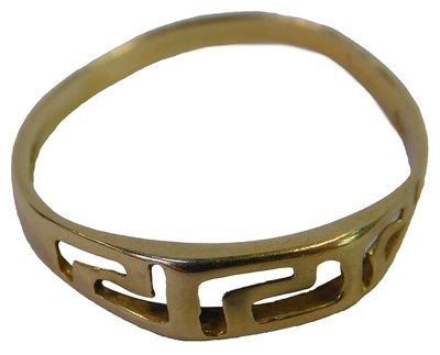 Lot 74 - A band with pierced decoration, yellow metal,...