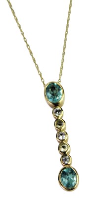 Lot 284 - An apatite and white sapphire pendant, of...