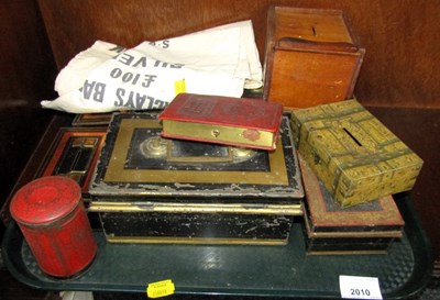 Lot 2010 - A group of cash tins and money bags. (1 tray)