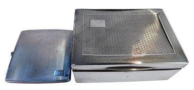 Lot 304 - A George V silver cigarette case, with engine...