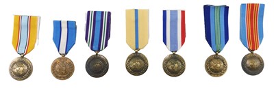 Lot 235 - A collection of UN medals, to include medals...