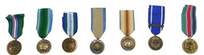 Lot 237 - A collection of UN medals, to include medals...