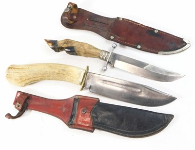 Lot 240 - A pair of German hunting knives, one with...