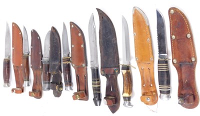 Lot 250 - A collection of hunting knives, one with blade...