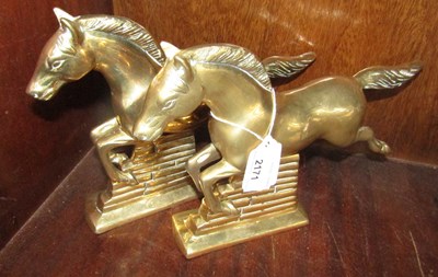 Lot 2171 - A pair of brass bookends modelled as horses,...