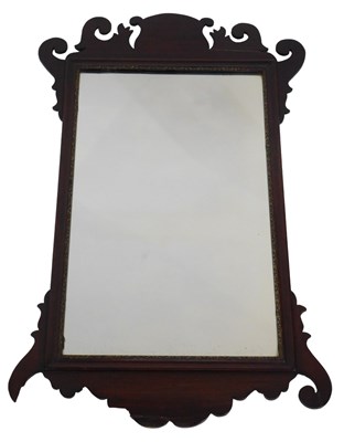 Lot 434 - A mahogany fret frame wall mirror in mid 18thC...