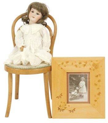 Lot 394 - An Armand Marseilles bisque head doll, wearing...