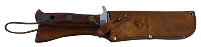 Lot 409 - A Puma White Hunter knife, with steel blade,...