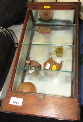 Lot 2085 - A wall-hanging display cabinet, 46cm high,...