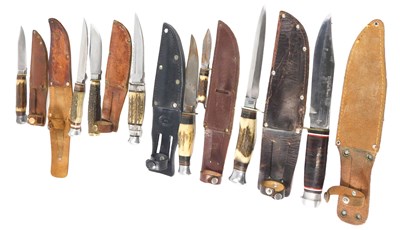 Lot 251 - A collection of hunting knives, some with...