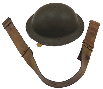Lot 261 - A British Army helmet, with liner and chin...