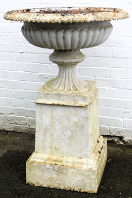 Lot 8 - A Victorian cast iron shallow urn, with egg...