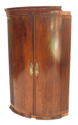 Lot 478 - An early 19thC mahogany bow fronted corner...