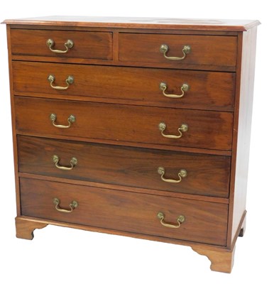 Lot 453 - A walnut chest of drawers in George III style,...