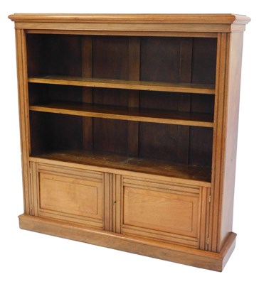 Lot 454 - A Victorian walnut bookcase, the top with a...