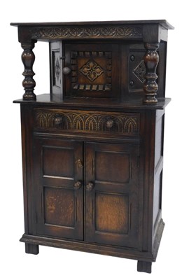 Lot 463 - A small 20thC oak court cupboard, with a...