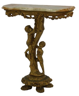 Lot 487 - A gilt console table, the shaped onyx top with...
