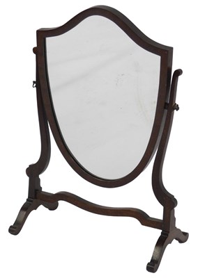 Lot 786 - A mahogany shield-shaped dressing table mirror,...