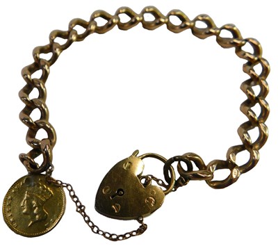Lot 13 - A curb link bracelet, with heart shaped...