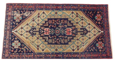 Lot 516 - A Persian rug, with a central pole medallion,...