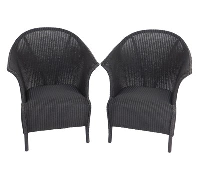 Lot 522 - A pair of Lloyd Loom Spalding black painted...