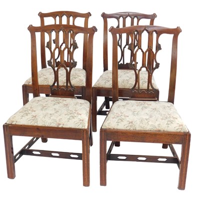 Lot 524 - A set of four George III mahogany dining...