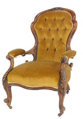Lot 535 - A Victorian walnut open armchair, with button...