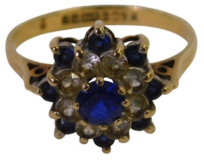 Lot 297 - A 9ct gold sapphire and CZ flower head ring,...