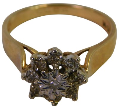 Lot 298 - A diamond flower head ring, in yellow...
