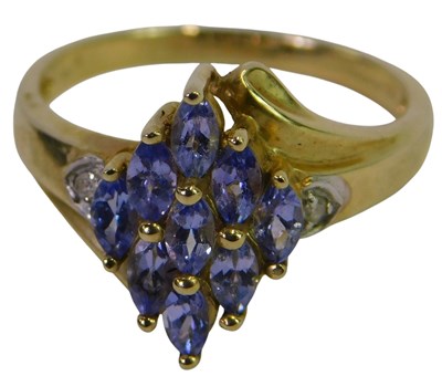 Lot 310 - A 9ct gold and amethyst ring, in a rhomboid...