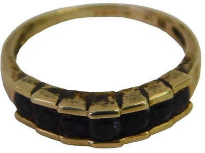 Lot 313 - A 9ct gold and sapphire seven-stone ring, size...