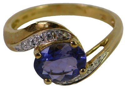 Lot 316 - A 9ct gold amethyst and diamond ring, in a...