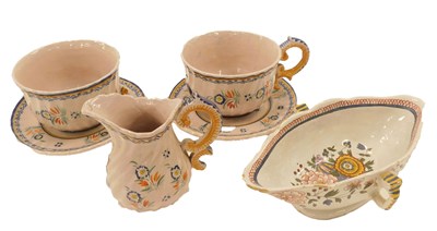 Lot 313 - A 19thC French Faience two handled sauce boat,...