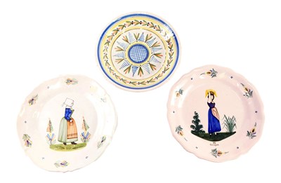 Lot 322 - A 19thC HB Quimper Faience plate, decorated...