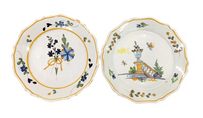 Lot 337 - An early 20thC French Faience plate, decorated...
