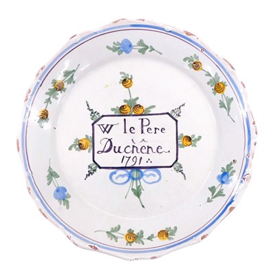 Lot 338 - An 18thC French Faience commemorative plate,...