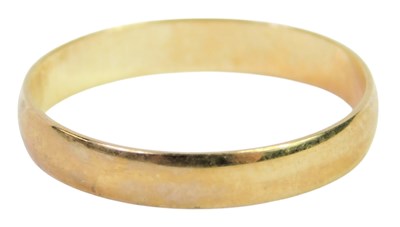 Lot 85 - A 9ct gold wedding band, size K 1/2, marked...