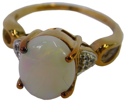 Lot 88 - A 9ct gold and opal ring, high claw set with...