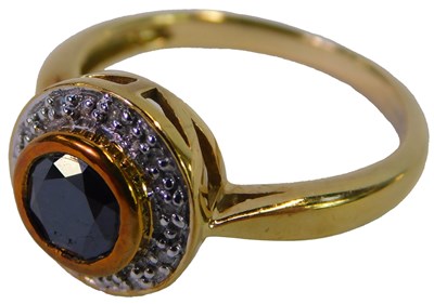 Lot 89 - A 9ct gold black and white diamond ring, size...