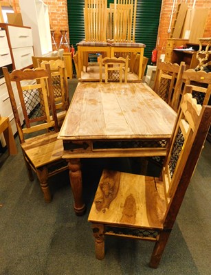 Lot 1005 - A Mexican hardwood dining table, with metal...