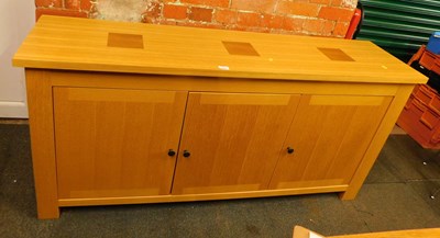 Lot 1008 - A light oak and walnut sideboard, with three...