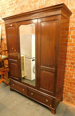 Lot 1009 - An Edwardian mahogany wardrobe, with a moulded...